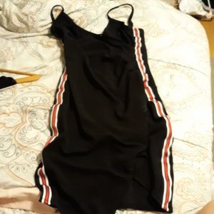 Black dress with red and white strip on the sides